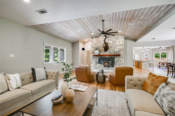Dining room, Fireplace, Interior, Living room, Pendant Lights, Recessed Lighting, Stone Walls, Wooden Ceilings, Wood Texture Flooring
