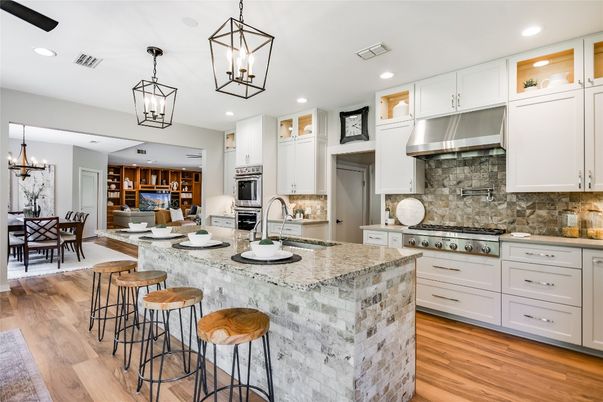Chandelier, Dining room, Interior, Kitchen, Pendant Lights, Recessed Lighting, Stainless Steel Appliances, Wood Texture Flooring