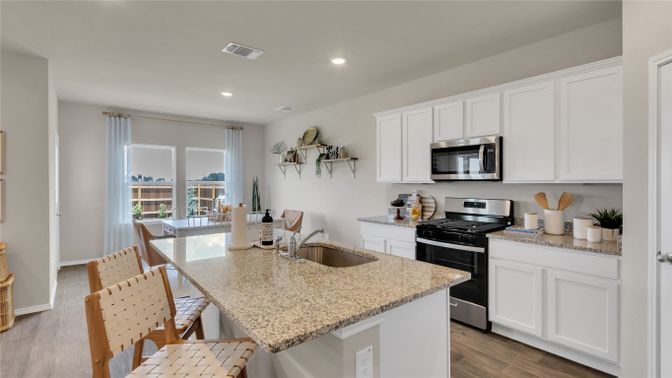 Dining room, Interior, Kitchen, Recessed Lighting, Stainless Steel Appliances, Wood Texture Flooring