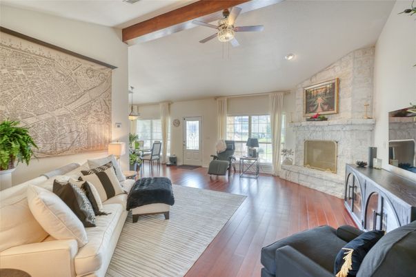 Fireplace, Interior, Living room, Pendant Lights, Recessed Lighting, Stone Walls, Wooden Beams, Wood Texture Flooring