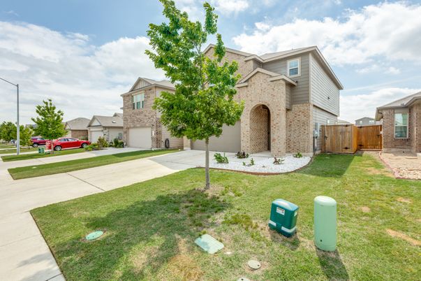 Attached, Backyard, Exterior, Facade, Brick Facade, None