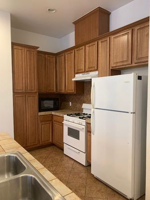 Interior, Kitchen, Recessed Lighting, Tile Countertops