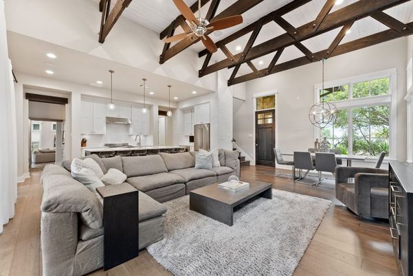 Chandelier, Dining room, Interior, Kitchen, Living room, Pendant Lights, Recessed Lighting, Stainless Steel Appliances, Wooden Beams, Wood Texture Flooring