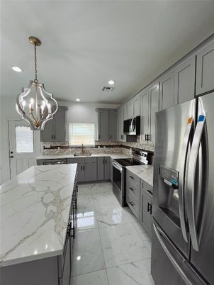 Chandelier, Interior, Kitchen, Marble, Pendant Lights, Recessed Lighting, Stainless Steel Appliances