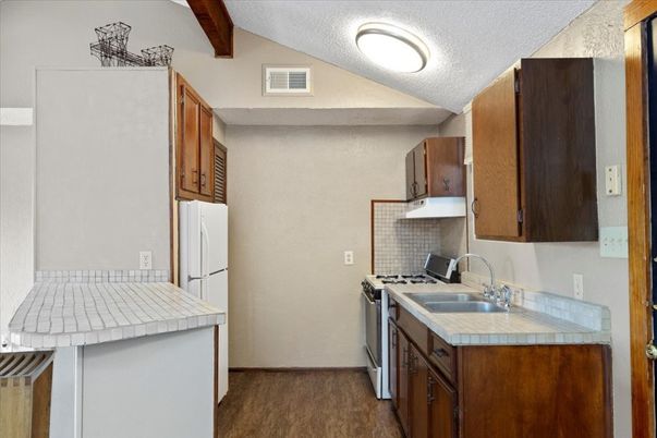 Interior, Kitchen, Tile Countertops, Wood Texture Flooring