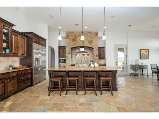 Interior, Kitchen, Pendant Lights, Recessed Lighting, Stainless Steel Appliances, Stone Walls