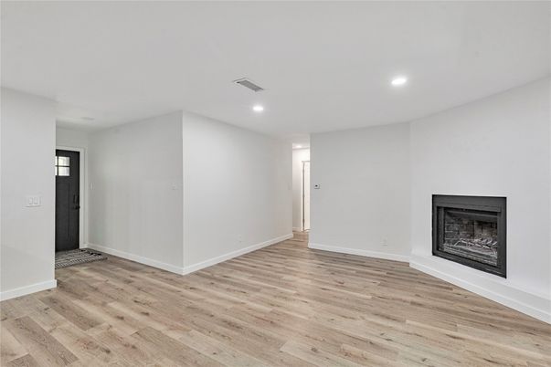 Empty room, Fireplace, Interior, Recessed Lighting, Wood Texture Flooring
