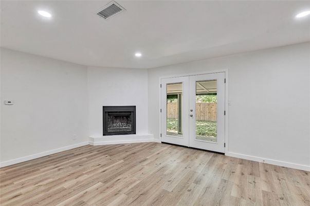 Empty room, Fireplace, Interior, Recessed Lighting, Wood Texture Flooring