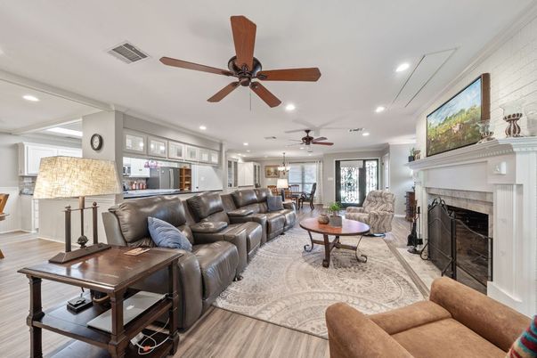 Dining room, Fireplace, Interior, Kitchen, Living room, Pendant Lights, Recessed Lighting, Stainless Steel Appliances, Wood Texture Flooring