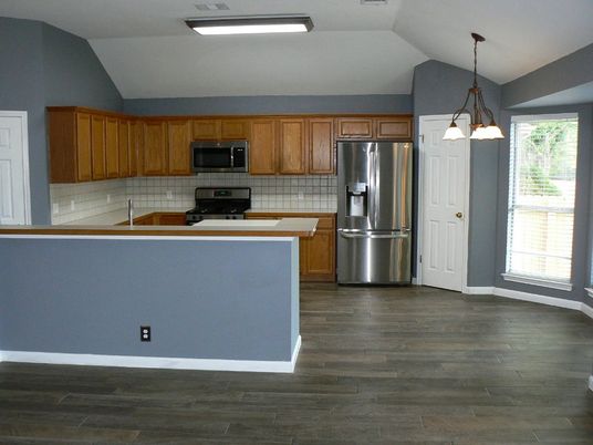 Interior, Kitchen, Pendant Lights, Stainless Steel Appliances, Tile Countertops, Wood Texture Flooring
