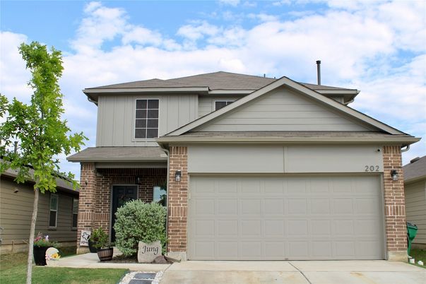 Attached, Exterior, Facade, Brick Facade, Brick Traditional