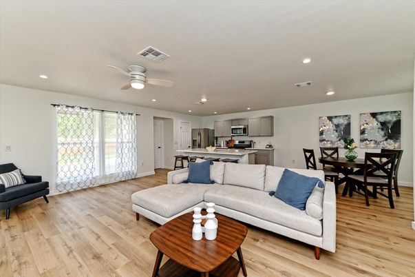 Dining room, Interior, Kitchen, Living room, Recessed Lighting, Stainless Steel Appliances, Wood Texture Flooring