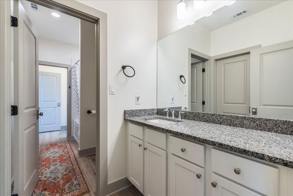Bathroom, Dual Sink Vanities, Interior, Recessed Lighting, Wood Texture Flooring