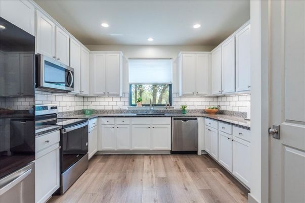 Interior, Kitchen, Recessed Lighting, Stainless Steel Appliances, Wood Texture Flooring