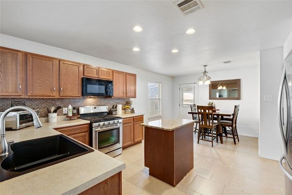 Dining room, Interior, Kitchen, Pendant Lights, Recessed Lighting, Stainless Steel Appliances
