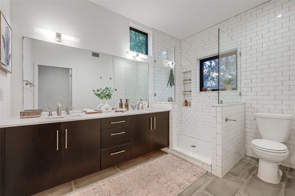 Bathroom, Dual Sink Vanities, Glass Shower, Interior, Stone Walls