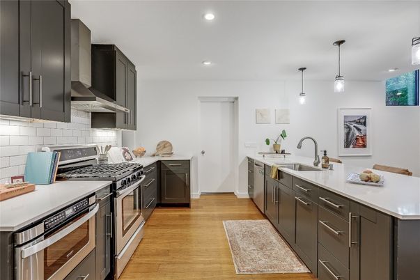 Interior, Kitchen, Pendant Lights, Recessed Lighting, Stainless Steel Appliances, Wood Texture Flooring