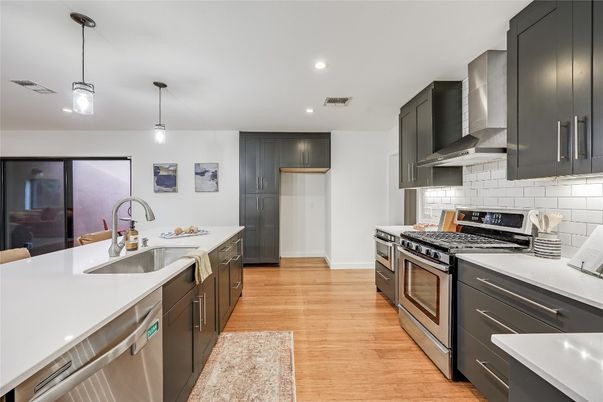 Interior, Kitchen, Pendant Lights, Recessed Lighting, Stainless Steel Appliances, Wood Texture Flooring