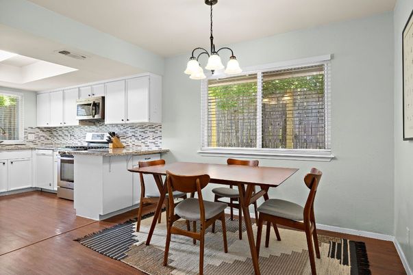 Dining room, Interior, Kitchen, Pendant Lights, Stainless Steel Appliances, Wood Texture Flooring