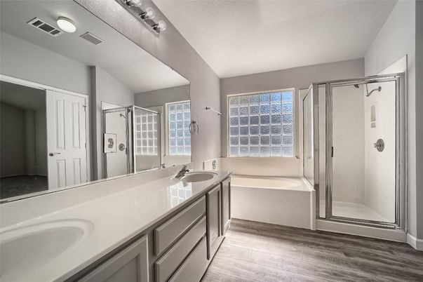 Bathroom, Dual Sink Vanities, Glass Shower, Interior, Wood Texture Flooring