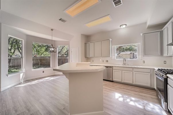 Interior, Kitchen, Pendant Lights, Stainless Steel Appliances, Wood Texture Flooring