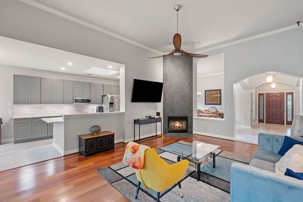 Fireplace, Interior, Kitchen, Living room, Recessed Lighting, Stainless Steel Appliances, Wood Texture Flooring