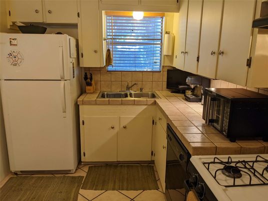 Interior, Kitchen, Tile Countertops, Wood Texture Flooring