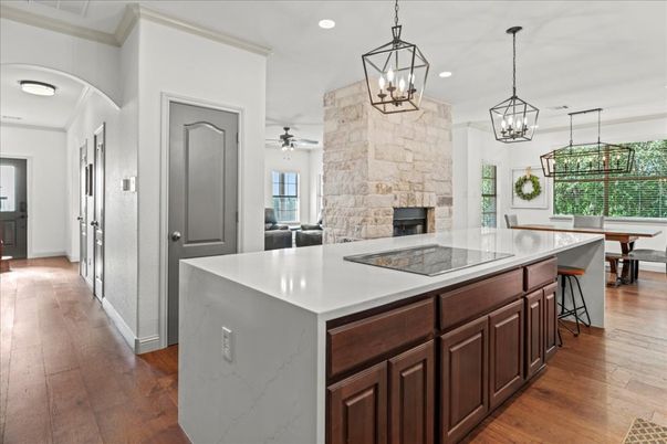 Dining room, Fireplace, Interior, Kitchen, Pendant Lights, Recessed Lighting, Wood Texture Flooring