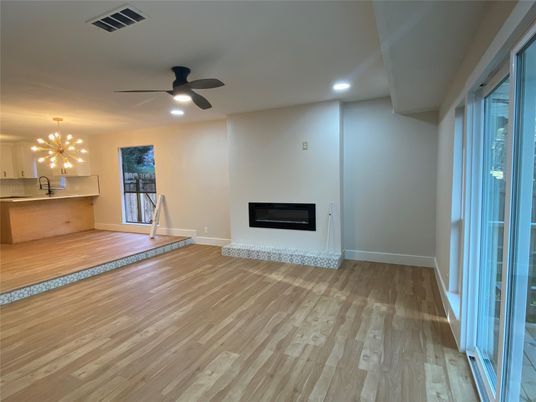 Empty room, Fireplace, Interior, Recessed Lighting, Wood Texture Flooring