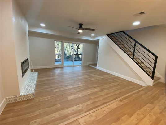 Empty room, Fireplace, Interior, Recessed Lighting, Wood Texture Flooring
