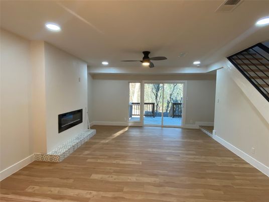 Empty room, Fireplace, Interior, Recessed Lighting, Wood Texture Flooring
