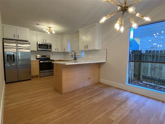 Interior, Kitchen, Pendant Lights, Stainless Steel Appliances, Wood Texture Flooring