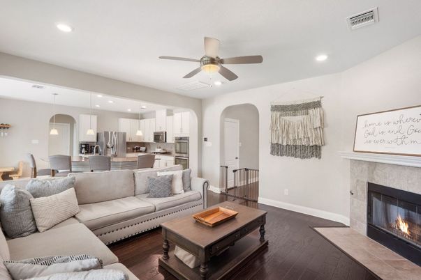 Dining room, Fireplace, Interior, Kitchen, Living room, Pendant Lights, Recessed Lighting, Stainless Steel Appliances, Wood Texture Flooring