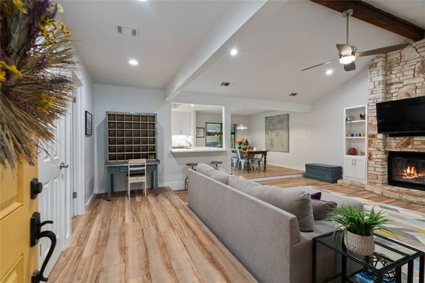 Dining room, Fireplace, Interior, Living room, Recessed Lighting, Stone Walls, Wooden Beams, Wood Texture Flooring