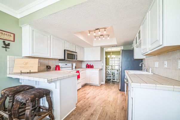 Dining room, Interior, Kitchen, Tile Countertops, Wood Texture Flooring
