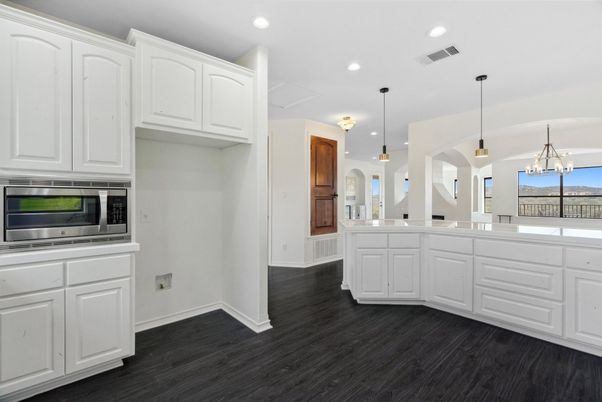 Chandelier, Interior, Kitchen, Pendant Lights, Recessed Lighting, Stainless Steel Appliances, Water, Wood Texture Flooring