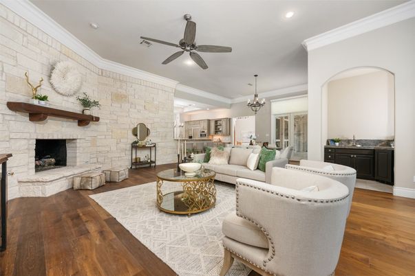 Chandelier, Fireplace, Interior, Kitchen, Living room, Pendant Lights, Recessed Lighting, Stone Walls, Wood Texture Flooring