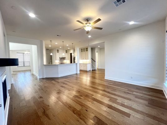 Empty room, Fireplace, Interior, Kitchen, Pendant Lights, Recessed Lighting, Wood Texture Flooring