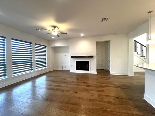 Empty room, Fireplace, Interior, Pendant Lights, Recessed Lighting, Wood Texture Flooring