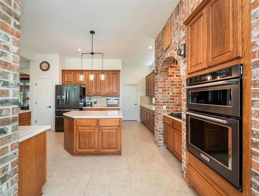 Interior, Kitchen, Pendant Lights, Recessed Lighting, Stainless Steel Appliances, Stone Walls