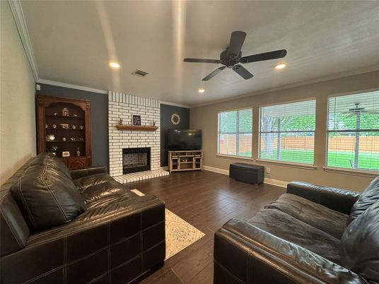 Fireplace, Interior, Living room, Recessed Lighting, Stone Walls, Wood Texture Flooring