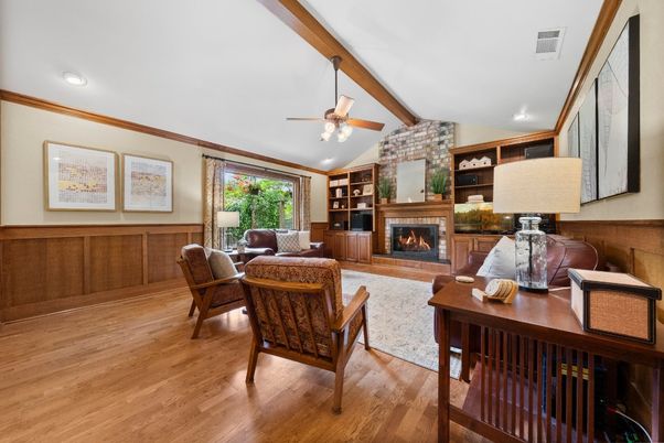 Fireplace, Interior, Living room, Recessed Lighting, Stone Walls, Wood Texture Flooring