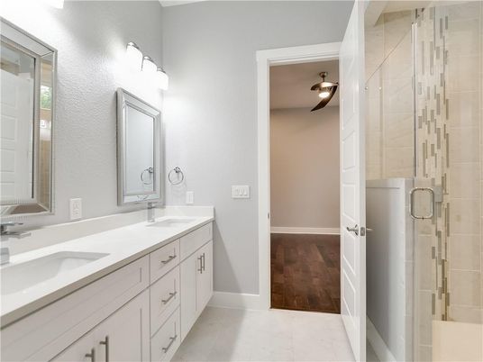 Bathroom, Dual Sink Vanities, Glass Shower, Interior, Wood Texture Flooring
