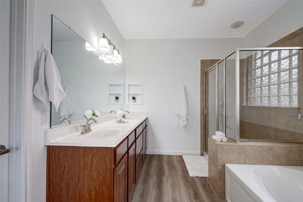 Bathroom, Dual Sink Vanities, Glass Shower, Interior, Wood Texture Flooring