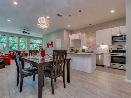Dining room, Interior, Kitchen, Pendant Lights, Recessed Lighting, Stainless Steel Appliances, Wood Texture Flooring
