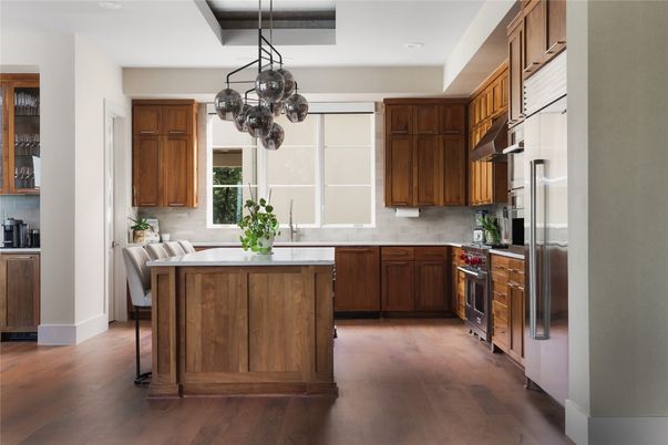Dining room, Interior, Kitchen, Pendant Lights, Recessed Lighting, Stainless Steel Appliances, Wood Texture Flooring