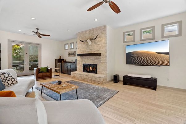Fireplace, Interior, Living room, Recessed Lighting, Stone Walls, Wood Texture Flooring