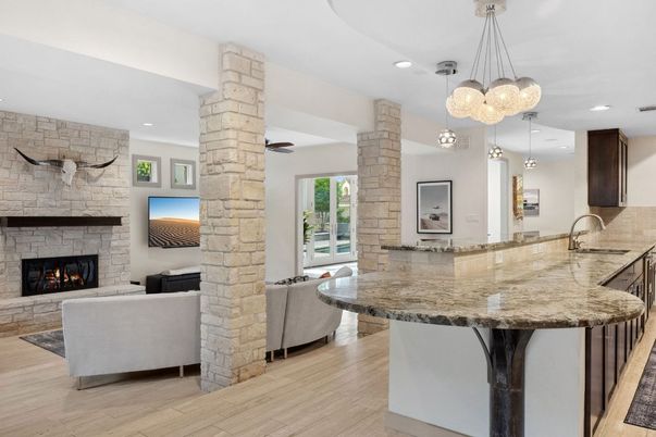 Fireplace, Interior, Kitchen, Living room, Pendant Lights, Recessed Lighting, Stone Walls, Wood Texture Flooring