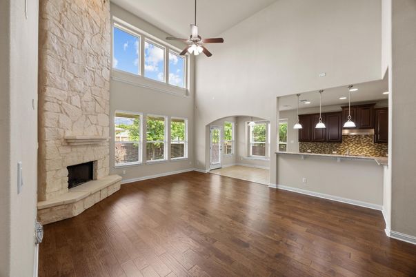 Fireplace, Interior, Kitchen, Pendant Lights, Recessed Lighting, Stone Walls, Wood Texture Flooring