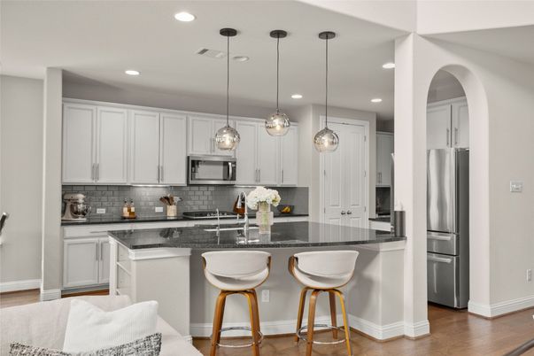 Interior, Kitchen, Pendant Lights, Recessed Lighting, Stainless Steel Appliances, Wood Texture Flooring